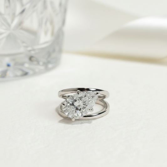 The "Horizon" East-West Pear Solitaire. #AJRG00008