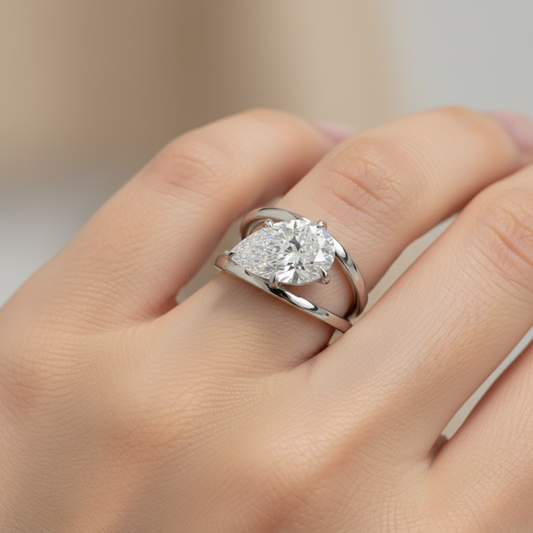 The "Horizon" East-West Pear Solitaire. #AJRG00008