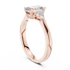 Emerald Pear Three Stone Ring