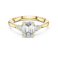 Emerald Pear Three Stone Ring
